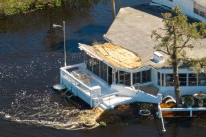 Resources 7 House damaged by flood and hurricane