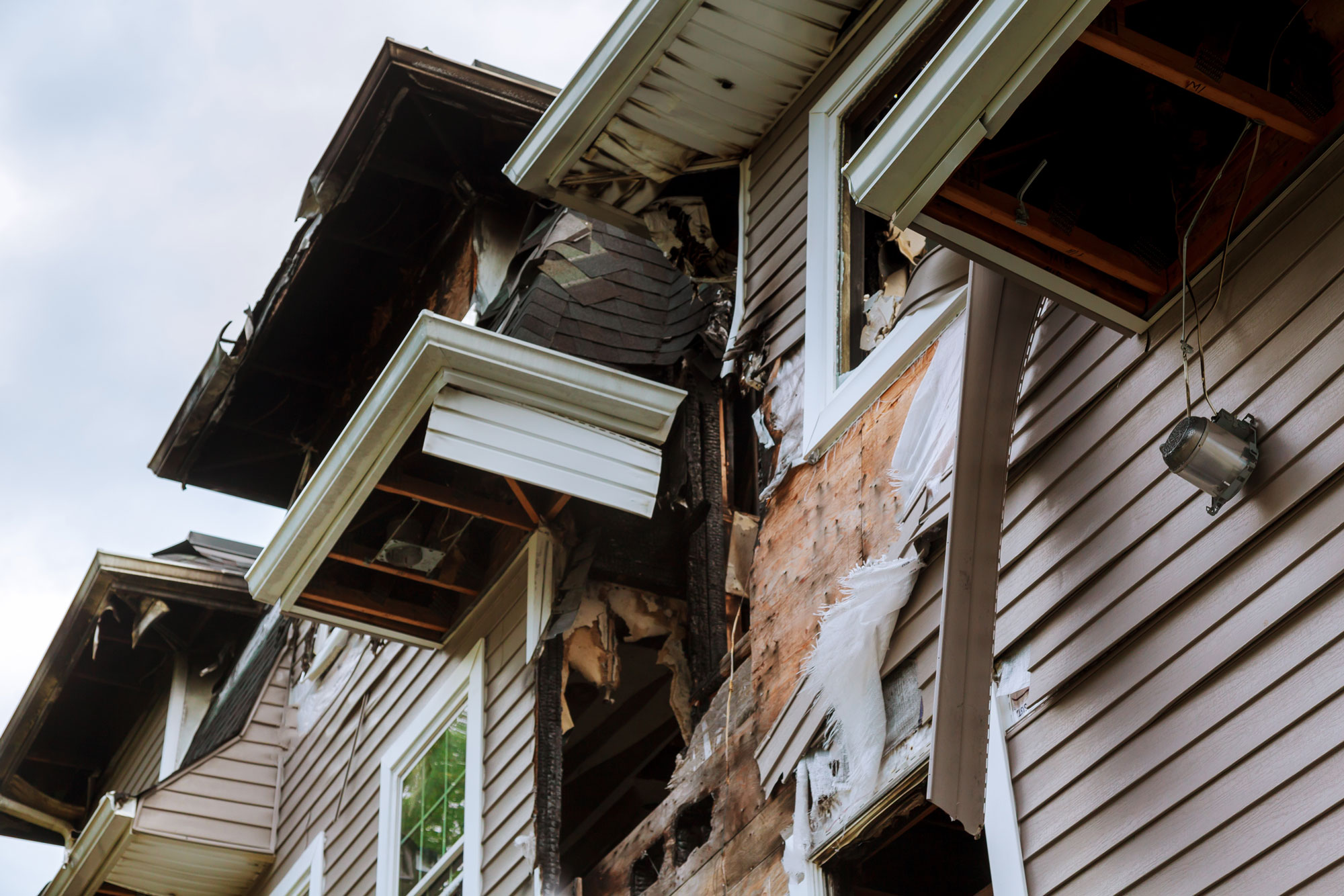exterior damage on a two story suburban house 2026 03 25 00 38 03 web